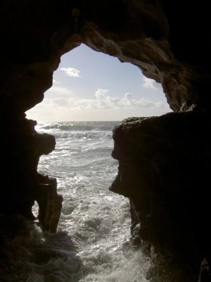 Looking out of the cave to the sea