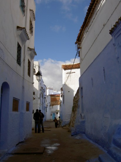 Notice how the buildings are painted blue to half way up...