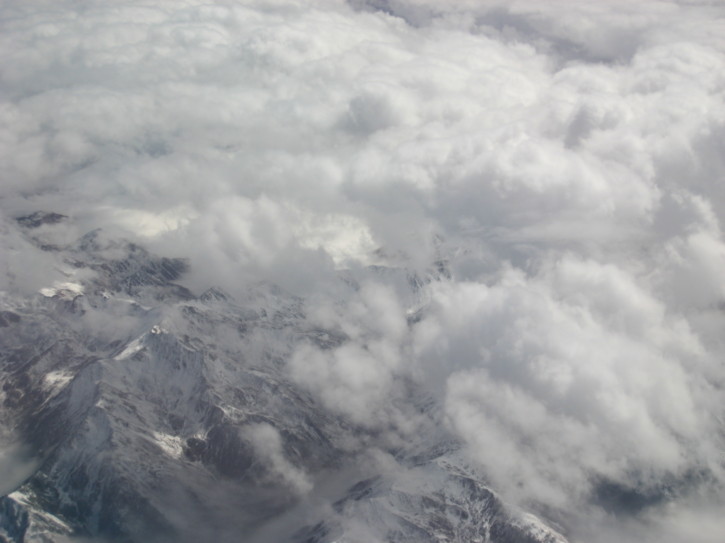 Mountains poke through the clouds