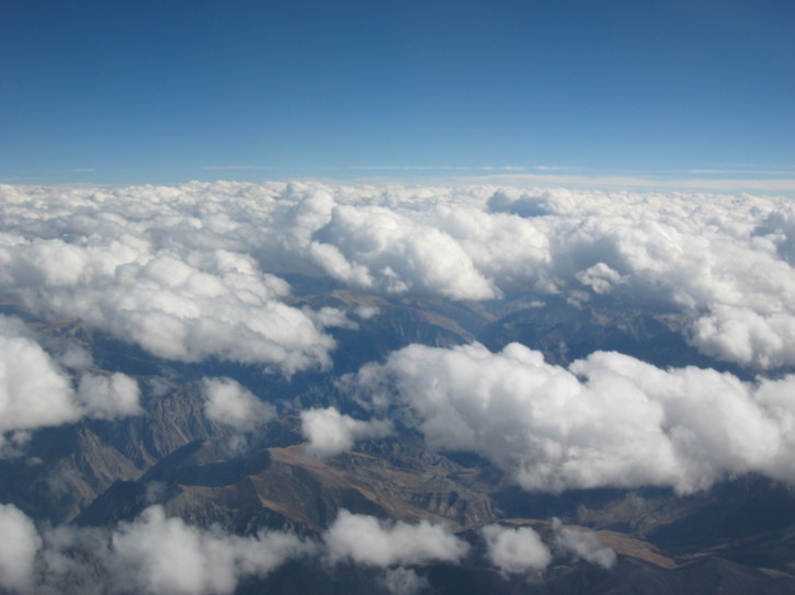 Barren Tibetan landscape seen through the clouds