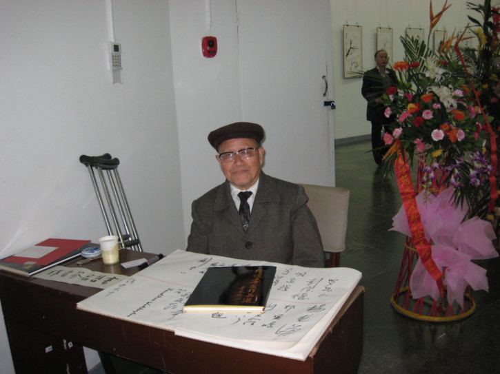 The artist with his book