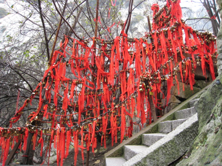 Padlocks with red (luck) ribbons