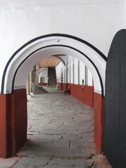 Along one of the arched coridors