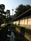 Higashi Hongan Temple moat with Kyoto Tower in the distance
