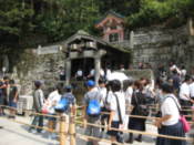 Children queue for washing