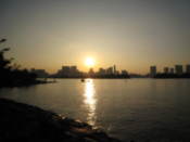 The sun starts to set over the bay