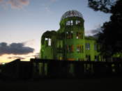 A-bomb building lit up at night