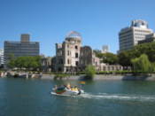 Boat on the Motoyasu-gawa passes the a-bomb building