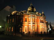 Western style building lit up at night