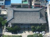 Looking down on a temple from Busan Tower