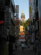 Myeong-dong Cathedral seen through a sea of consumerism
