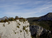The near-vertical rock face down into the gorge