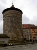A large tower just over the road from the station
