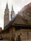 Another church, with a smoking building in front