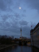 The TV tower points up to the moon