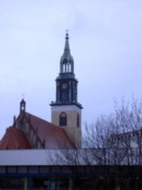 A church tower near to the TV tower