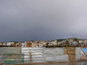 A view of some of the town, with a building site in the foreground