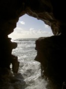 Looking out of the cave to the sea