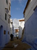 Notice how the buildings are painted blue to half way up...