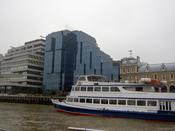 A boat and a weird building
