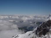 A break in the clouds reveals part of the valley