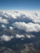 Barren Tibetan landscape seen through the clouds