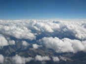 Barren Tibetan landscape seen through the clouds