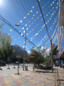 Prayer flags along the shopping street