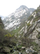 Walking at the base of the mountain