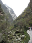 Walking at the base of the mountain