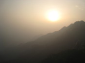 Sun, pollution and mountains