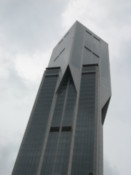 Skyscraper reaching up into the clouds