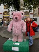 Mum standing with a pink teddy