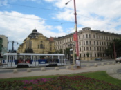 A tram on the road by the promenade