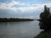 Looking over the river to hills in Austria