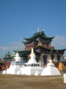 Temple with stupas in front of it
