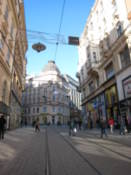 Tram lines run along a central Brno street